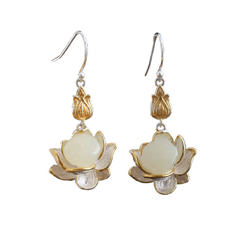 Studio shot of TheFuMaster White Jade Lotus Earrings blending gold and silver tones for balanced energy