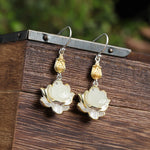TheFuMaster White Jade Lotus Protection Drop Earrings handcrafted in sterling silver symbolizing peace and harmony