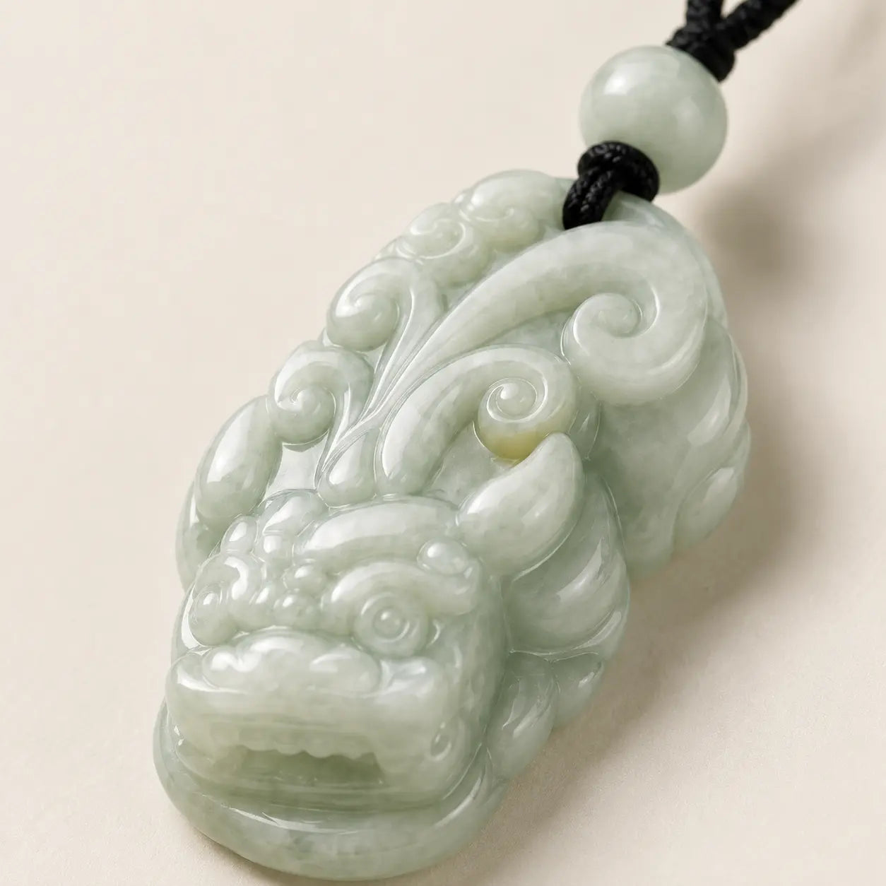 White Jade Pixiu Pendant shown from another angle with white jade and pixiu