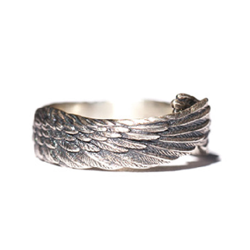 Side view of Wing Luck Silver Ring showing detailed feather engravings – TheFuMaster
