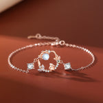 Model wearing TheFuMaster Moon Flower Moonstone Bracelet in rose gold, capturing a gentle and feminine style