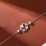 TheFuMaster Moon Flower Moonstone Bracelet in silver, featuring a radiant moonstone centerpiece and elegant rabbit details