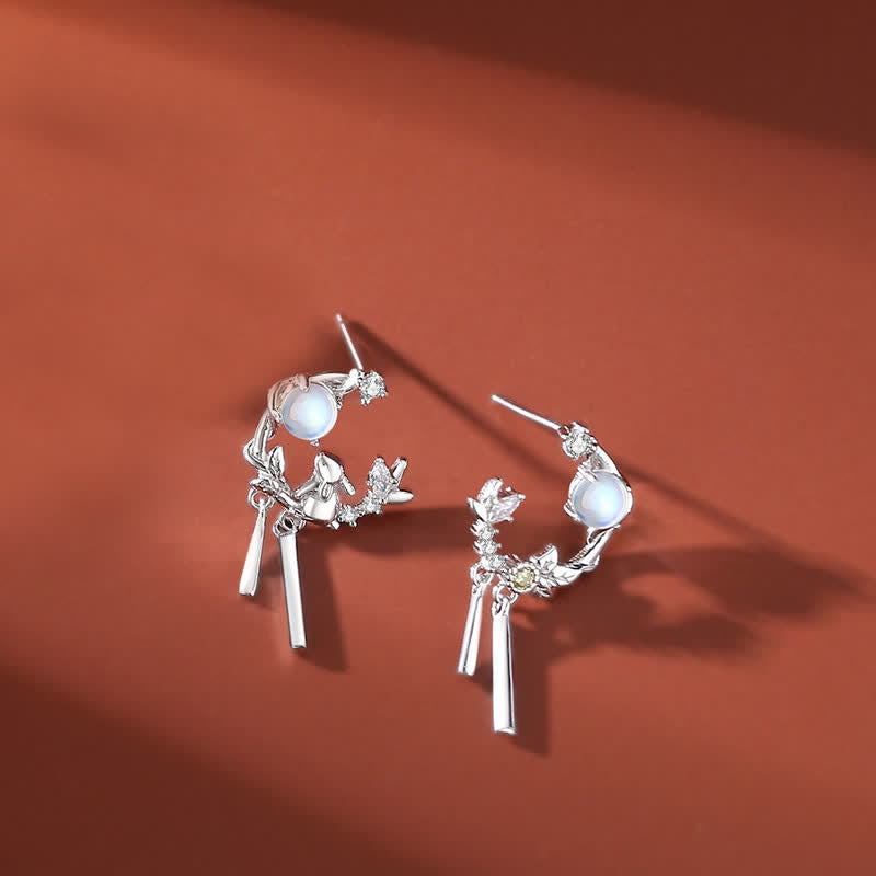 TheFuMaster Moon Flower Moonstone Earrings in silver, designed with a cool-toned moonstone and fine craftsmanship