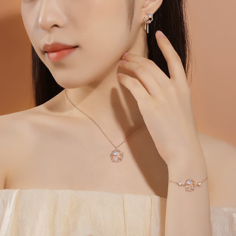 Model wearing TheFuMaster Year of the Rabbit Moon Flower Moonstone Necklace in rose gold, showing elegant neckline