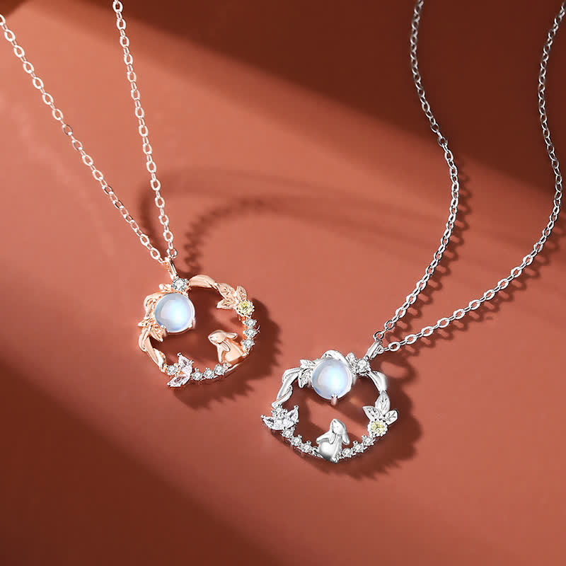 Two rose gold Moon Flower Moonstone Necklaces from TheFuMaster, reflecting soft light and elegant craftsmanship